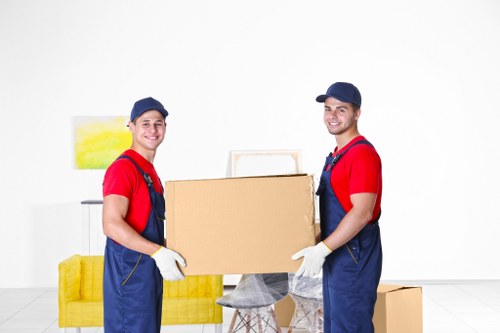 Office relocation planning in Ruislip with moving boxes and workstations