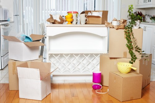 Professional man and van loading furniture in Ruislip