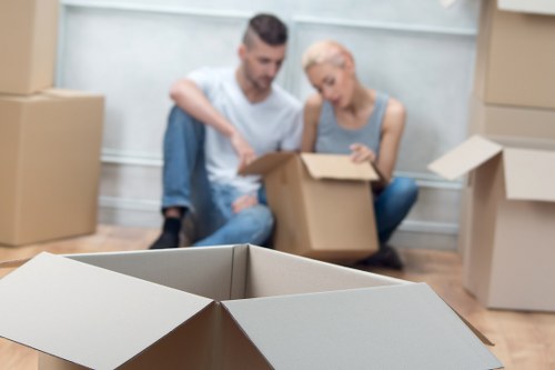 Professional office removals preparation with labeled equipment and files