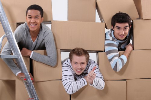 Team handling a heavy piano safely during removals in Ruislip