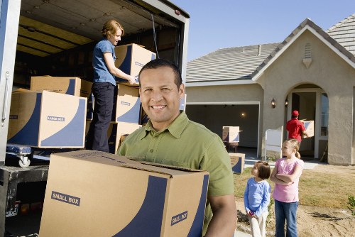 Removal team loading furniture during a Ruislip apartment relocation